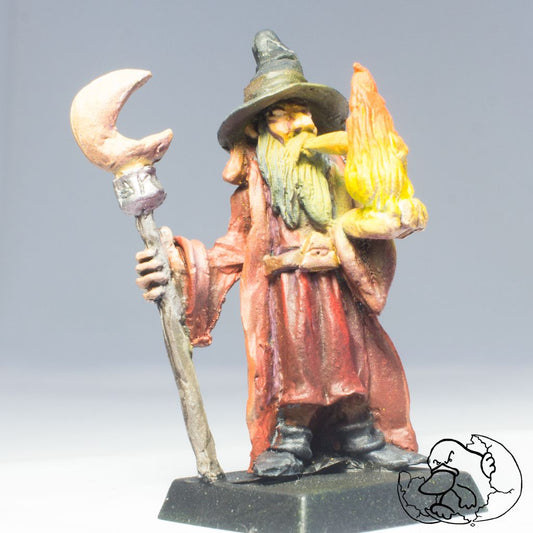 human fantasy metal mini painted of a fire wizard ideal for role playing games and wargame