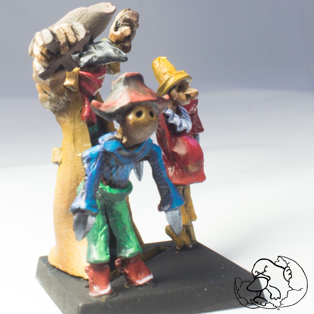 Pewter miniature painted of a warlock character with puppets for role playing games dungeon and wargames created by the platypus egg