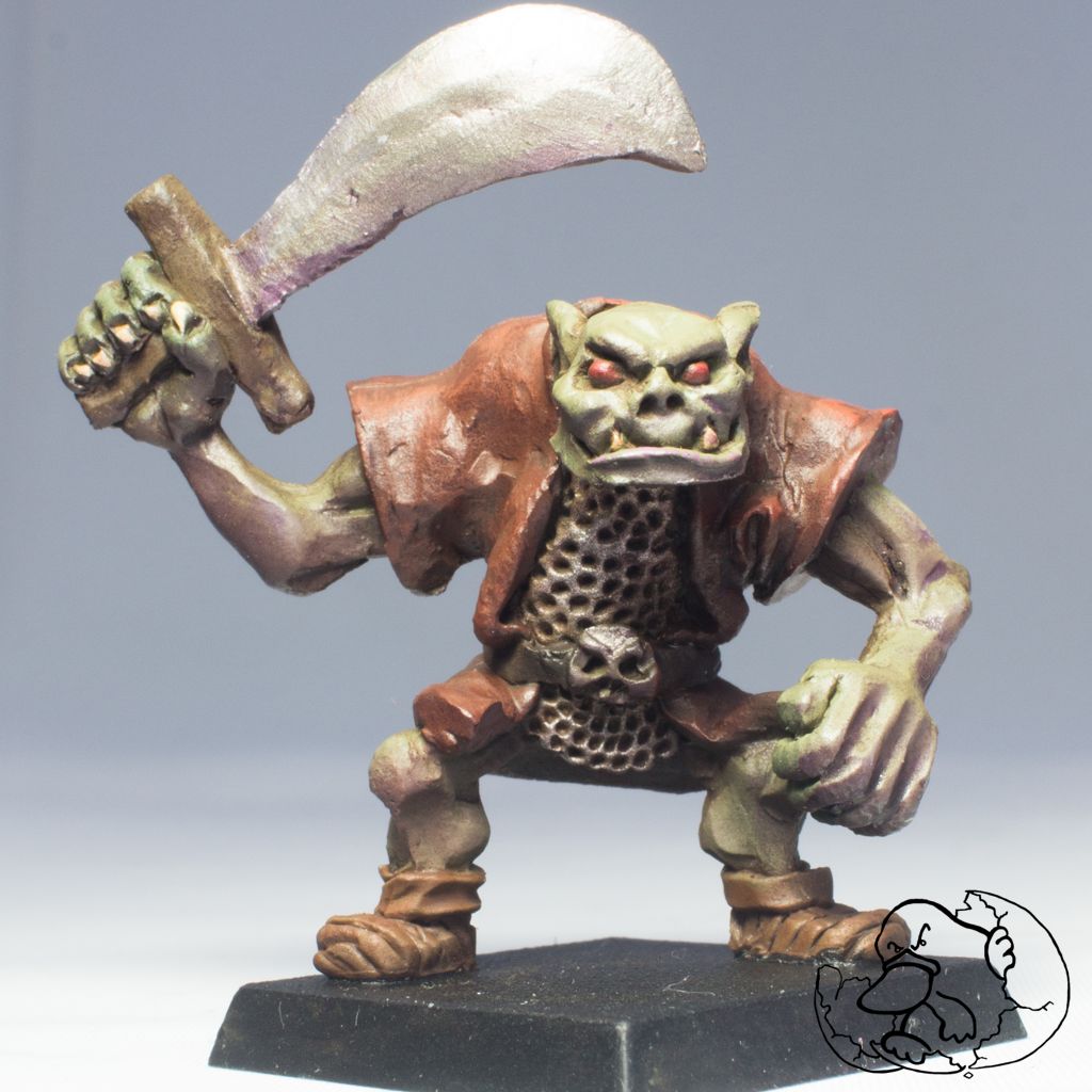 orc warrior metal painted mini in 28mm ideal for role playing game and wargame