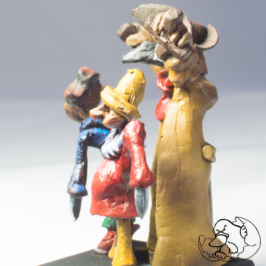 epic fantasy metal miniature painted of a puppetmaster with puppets ideal for role playing games and wargames