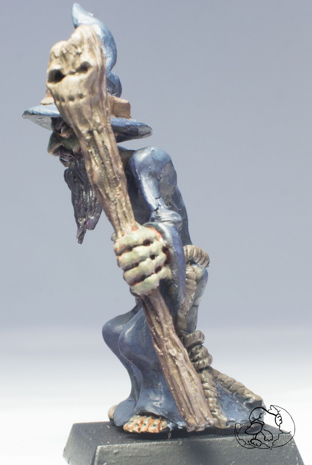 detail of a warlock or wizard undead epic fantasy mini  in pewter